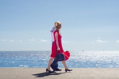 This lady walked along the prom' with her man on a windy day and the red dress played in the wind making a nice contrast with the blue of the sea (September 2017).